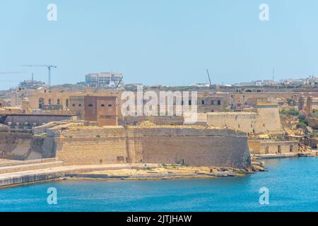 Vista del Forte Ricasoli da la Valletta, Malta Foto Stock