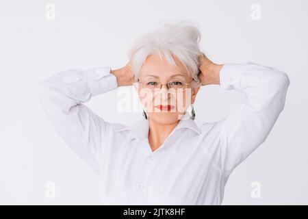 donna senior ritratto fiducia eleganza fotocamera Foto Stock