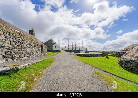 Gearrannan Black House Village, Dun Carloway, Isola di Lewis, Scozia Foto Stock