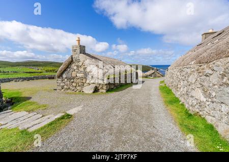 Gearrannan Black House Village, Dun Carloway, Isola di Lewis, Scozia Foto Stock