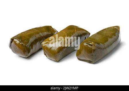 Pezzi di dolmades greci isolati su fondo bianco primo piano Foto Stock