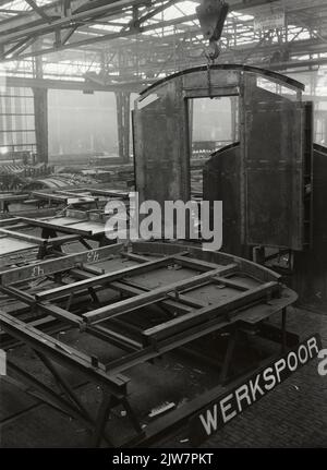 L'immagine del montaggio di una parete di testa di una vasca del treno Diesel-elettrico imposta la 3 (serie 11-50) della N.S. a Werkspoor a Zuilen. Foto Stock