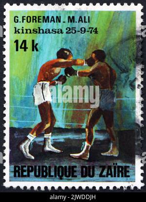 CONGO - CIRCA 1974: Un francobollo stampato in Congo mostra la lotta Foreman-Ali, match mondiale di pugilato tra George Foreman e Muhammad Foto Stock