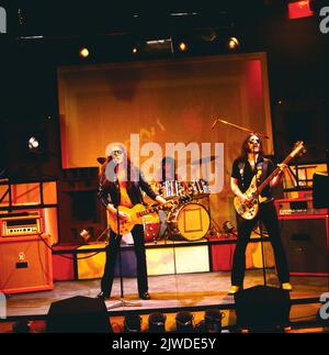 Motörhead, englische Heay Metal, Hard Rock, Speed Metal Band, mit bassista Lemmy Kilmister, rechts, Auftritt, circa 1979. Motörhead, inglese Heavy Metal, Hard Rock e Speed Metal Band, con il bassista Lemmy Kilmister, a destra, performance, circa 1979. Foto Stock