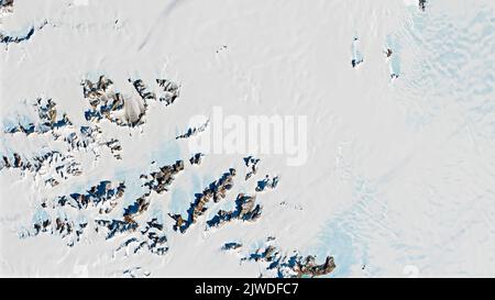 Meteorite in Antartide, vista dall'alto delle vette innevate texture di fondo. Elementi di questa immagine forniti dalla NASA. Foto Stock