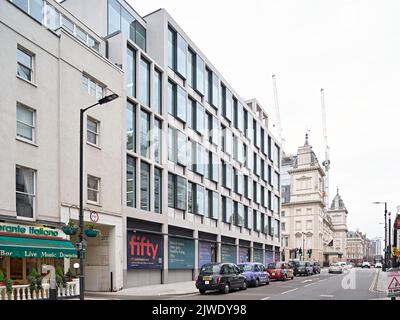 Vista sulla facciata di Craven Road. 50 Eastbourne Terrace, Londra, Regno Unito. Architetto: Sheppard Robson, 2021. Foto Stock