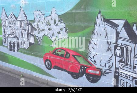 Immagine di un'auto a idrogeno Rasa Riversimple su un muro presso la stazione di rifornimento McFilling, Abergavenny, Monmouthshire, Galles Foto Stock