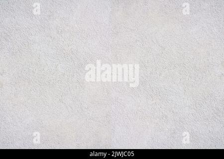 La struttura di intonaco acrilico grigio - un primo piano di una parete intonacata Foto Stock