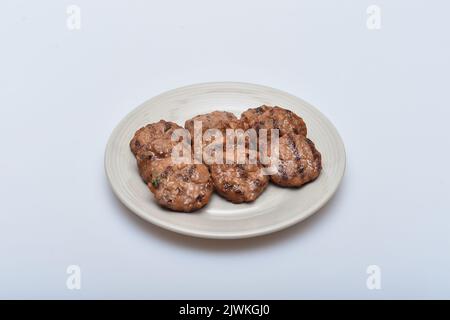 Un piatto di deliziosa purè di carne marinata su un piatto Foto Stock