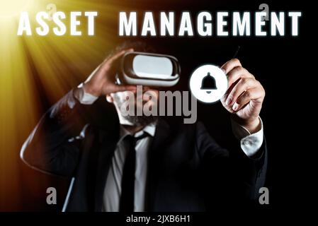 Scrittura a mano di testo Asset Managementprocesso sistematico di gestione e smaltimento delle risorse. Panoramica aziendale processo sistematico di funzionamento e. Foto Stock