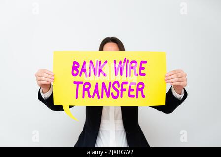 Visualizzazione concettuale Bonifico bancario TransferTrasferimento elettronico di denaro tramite banca a banca. Concetto che significa trasferimento elettronico di denaro tramite banca a. Foto Stock