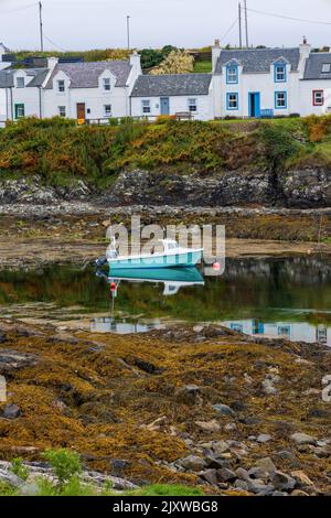 Portnahaven è un grazioso villaggio costiero sull'isola scozzese di Islay Foto Stock