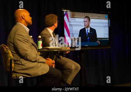 Welcome Back Town Hall Meeting, on Impact of October 1-16, 2013 chiusura del governo federale, con il Segretario Shaun Donovan e il Vice Segretario Maurice Jones presiedere, e con trasmissione dal Presidente Barack Obama. Foto Stock