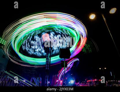 Il giro della "zona giochi" che si ferma al cuore della fiera annuale di St Giles, Oxford. Foto Stock