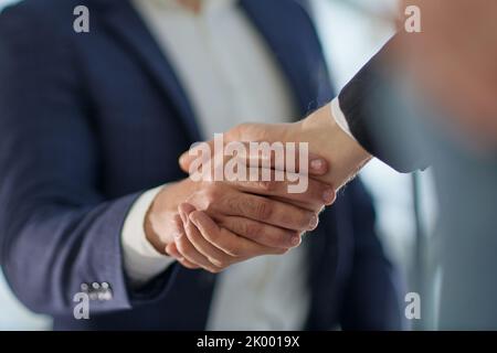 Questa fusione vedrà la crescita potenziale della nostra attività Foto Stock