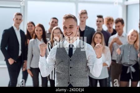 un buon leader davanti al team aziendale Foto Stock