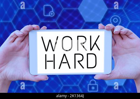 Segno che mostra lavoro duro. Panoramica aziendale che lavora per svolgere e completare le attività Foto Stock