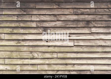 Struttura rustica del rivestimento di legno, orizzontale non verniciato vecchio listelli di legno fondo Foto Stock