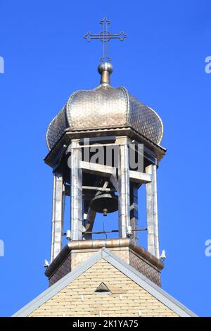 L'église Saint-Nicolas de Combloux et son clocher à bulbe classé au titre des Monuments historiques en 1971. Combloux. Alta Savoia. Auvergne-Rhône-al Foto Stock