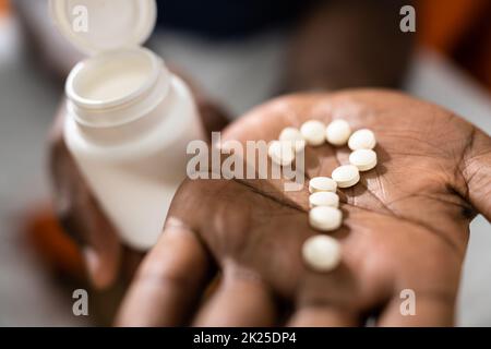 Farmacia Painkillers e Vitamin Supplements scelta Foto Stock