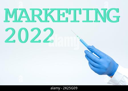 Cartello di testo che mostra Marketing 2022. Approccio commerciale tendenze commerciali per il 2022 nuovo anno evento promozionale ricercatore visualizzazione Virus Prevention Method, New Infection Cure Ideas Foto Stock