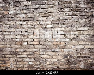 Senza cuciture rosso mattone parete sfondo. Vecchio rosso mattone grunge parete sfondo. Foto Stock