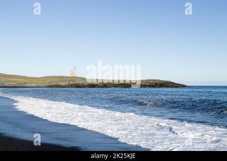 Paesaggio del faro di Hvalnes, punto di riferimento dell'Islanda orientale Foto Stock