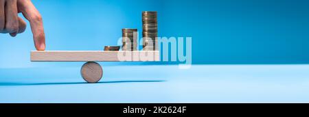 Leva finanziaria ed equilibrio economico Foto Stock