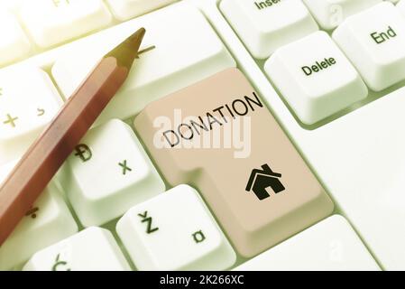 Ispirazione che mostra la donazione di segni. Idea di affari qualcosa che è dato ad una carità, particolarmente una somma di soldi che digita i codici di programma del firewall, le regole di scrittura e il libro di regolamenti Foto Stock