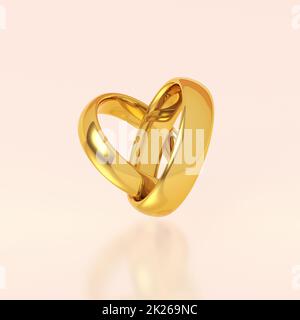 Due golden gli anelli di nozze Foto Stock