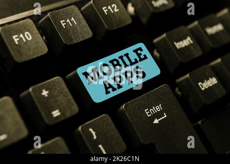 Didascalia di testo con le app mobili. Word scritto su un'applicazione software progettata per essere eseguito su dispositivi palmari Abstract Office Typing Jobs, typewriting rapporti di lavoro importanti Foto Stock