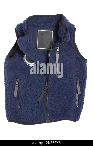 Gilet in pelliccia. Un gilet in pelliccia blu con fodera in lana blu e cerniera per il ragazzino isolato su sfondo bianco. Bambino primavera e moda autunno. Foto Stock