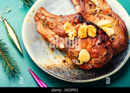 Arrostire la carne in salsa all'aglio Foto Stock