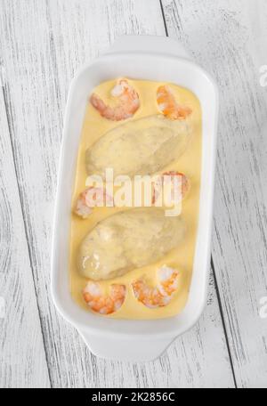 Quenelle con salsa olandese Foto Stock