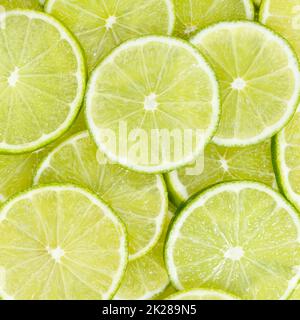 Limes agrumi lime raccolta cibo fondo quadrato frutta fresca Foto Stock