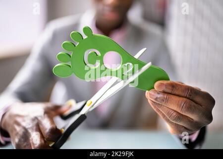 Cartello con impronta di anidride carbonica. Riduzione di CO2 Foto Stock