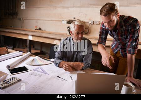 Trasformare la sua visione in realtà. Un architetto che progetta. Foto Stock