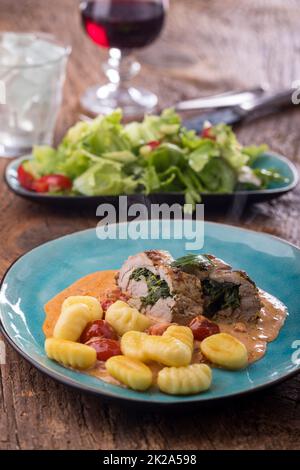 filetto di maiale con gnocchi Foto Stock