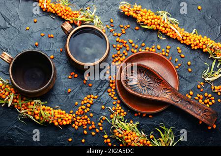 Tè stagionale alle buckthorn di mare Foto Stock