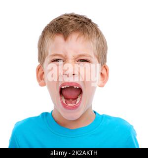 HES crescerà in grande. Studio girato di un ragazzo vestito casualmente isolato su bianco. Foto Stock