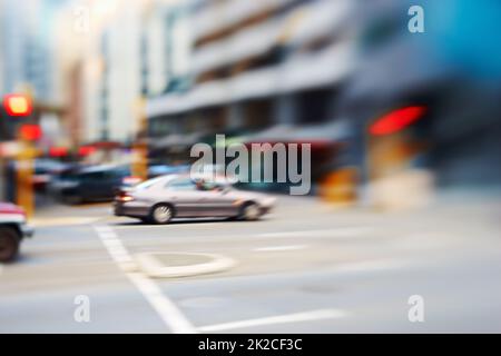 Città sfocata - immagini di sfondo. Immagini della città sfocate astratte. Foto Stock