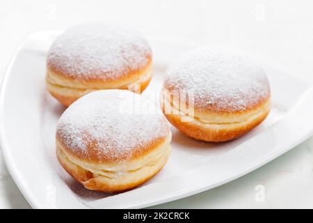 ciambelle piene di marmellata di albicocche Foto Stock