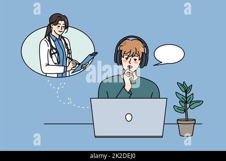 Uomo parla in videochiamata con il medico Foto Stock