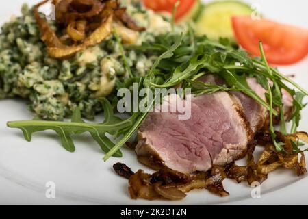 fette di filetto di maiale Foto Stock