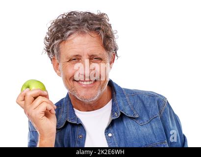 Il vostro verde sopra. Studio girato di un uomo maturo isolato su bianco. Foto Stock