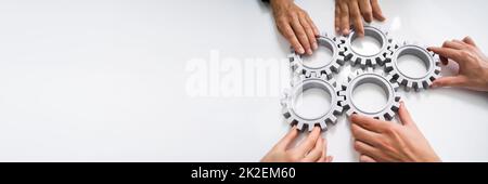 L'innovativo team per uomini d'affari si unisce a tutti gli ingranaggi Foto Stock