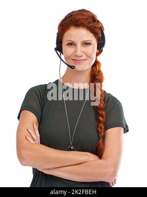 Gestire i clienti come un professionista. Ritratto di un giovane e attraente rappresentante del servizio clienti che indossa una cuffia. Foto Stock