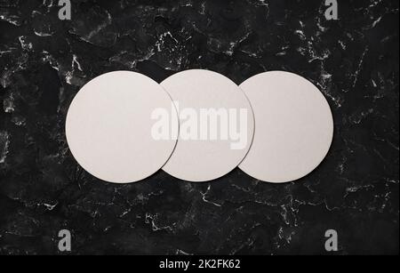 Tre birre coasters Foto Stock