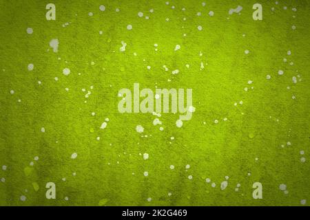 Astratto arte sfondo colori verde brillante. Acquerello su tela con sfumatura ambra tenue. Spruzzi bianchi. Textur acquerello ad alta risoluzione Foto Stock