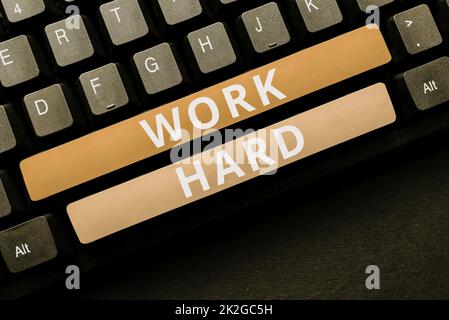 Segno che mostra lavoro duro. Attività di business showcase che si impegna a svolgere e completare le attività Foto Stock